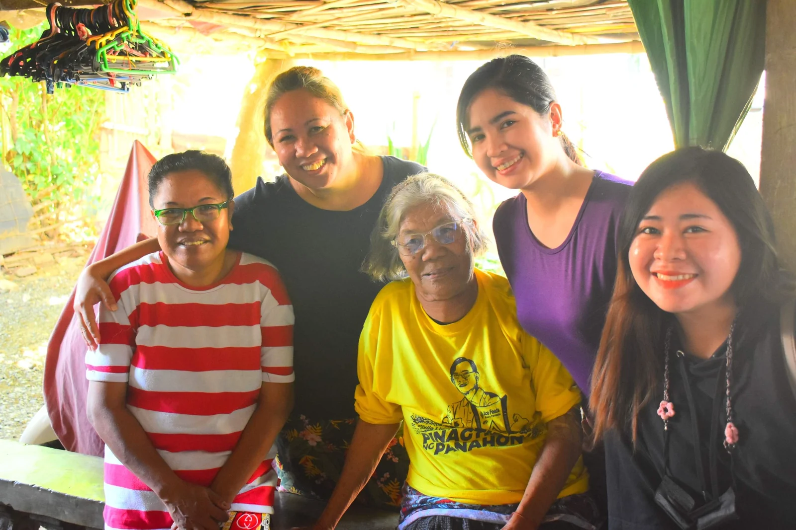 A local church worker visiting and listening to community members