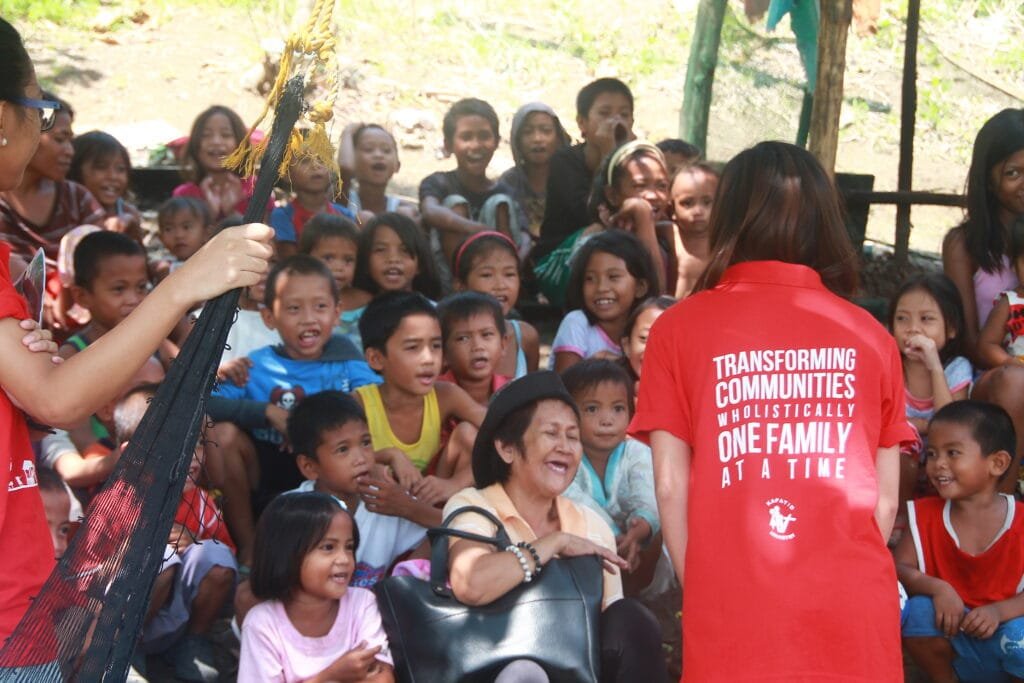 Children gathered for a church feeding activity in San Fernando