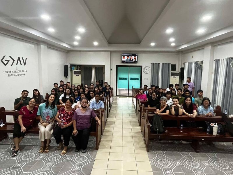 Church members gathered in prayer