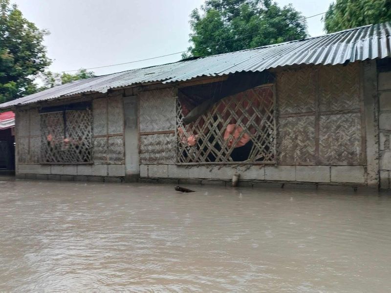 Community roads submerged in flood water